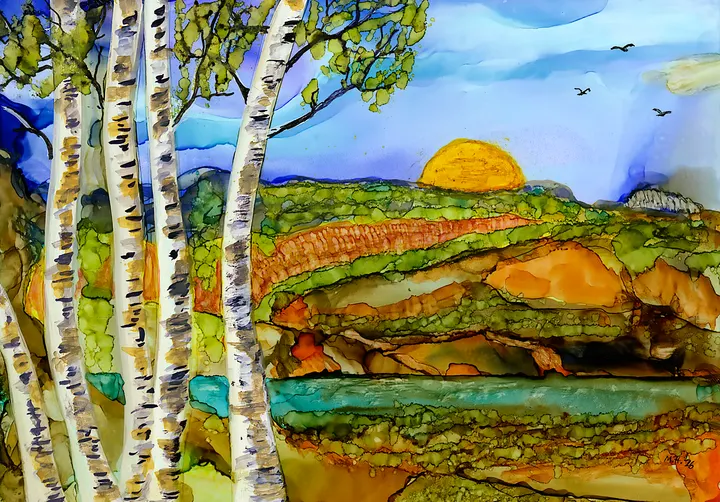 Birch trees framing layered hills and a rising yellow sun with birds in a blue sky
