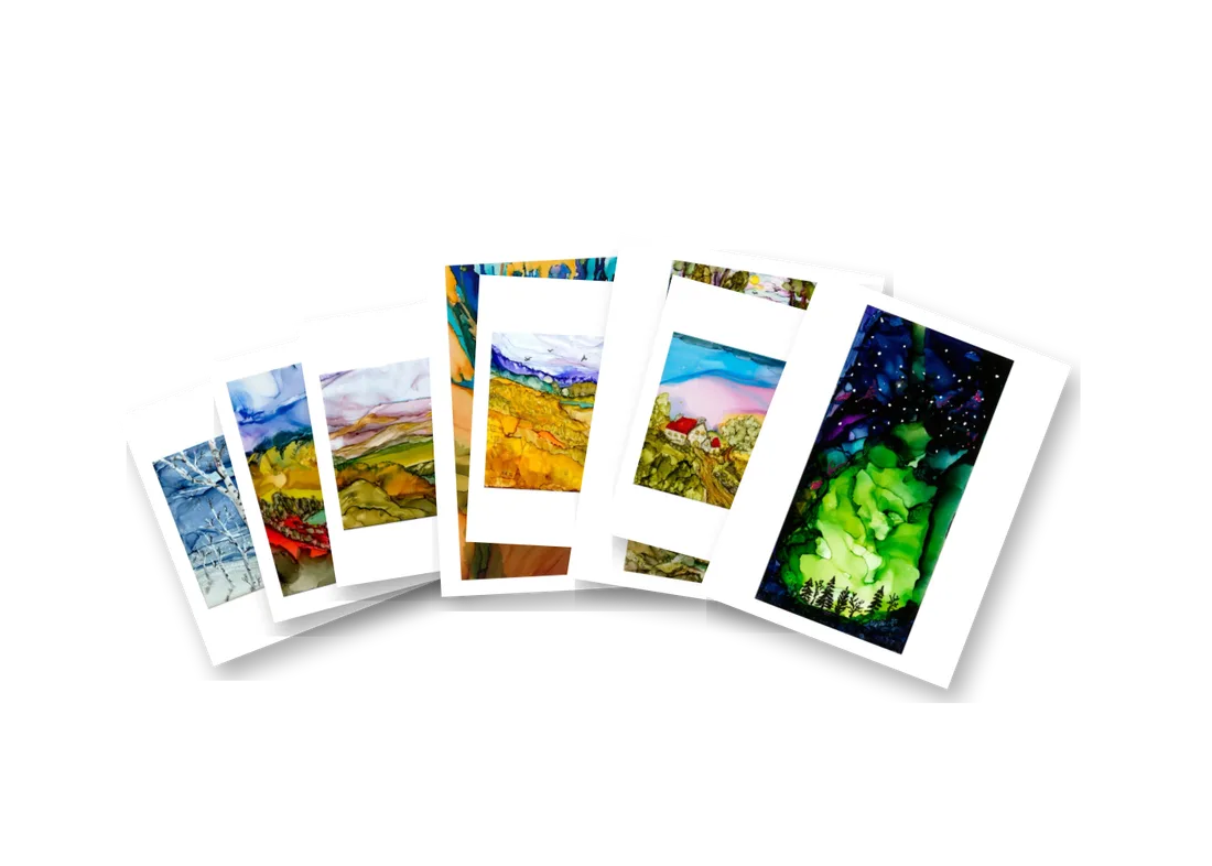 Illustration : Les 8 cartes, chacune signée, dans une boîte-cadeau avec un mot personnel de Manfred.